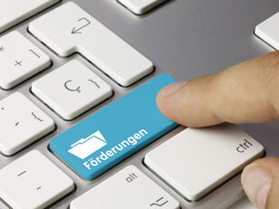 Ausschnitt Computertastatur mit Taste "Förderungen"